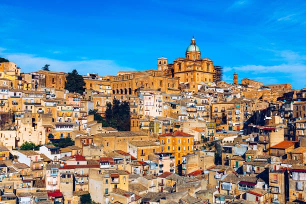 Piazza Armerina in the Enna province of Sicily in Italy. Piazza Armerina cityscape with the Cathedral SS. Assunta and old town, Sicily, Piazza Armerina, Province of Enna, Sicily, Italy, Europe.